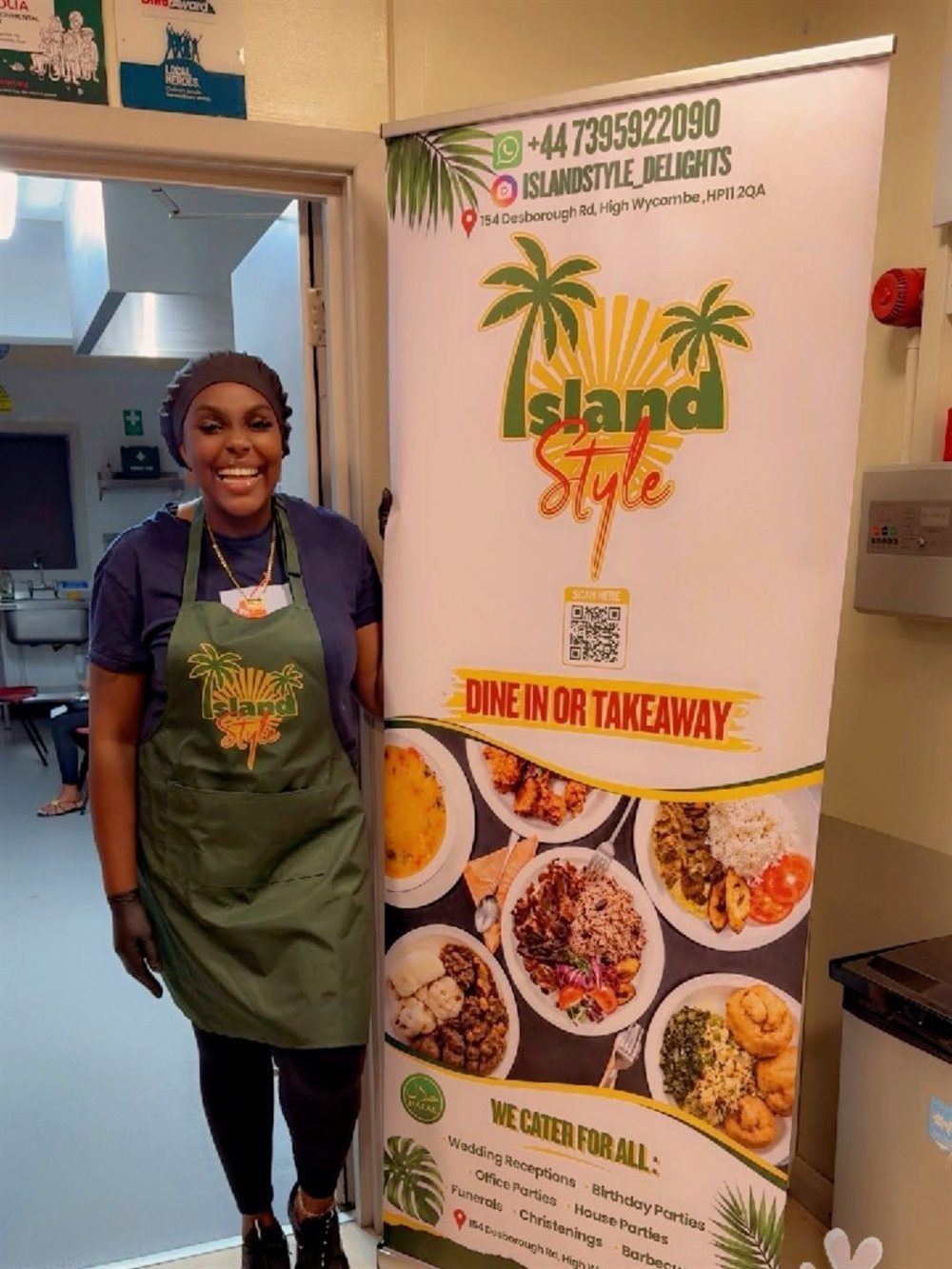 The Island Style team with their Dine in or Takeaway banner
