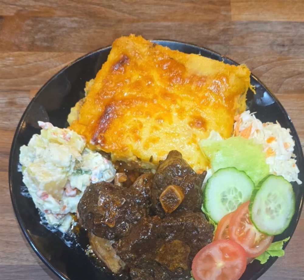 Shepherd's pie and stewed oxtail with salad